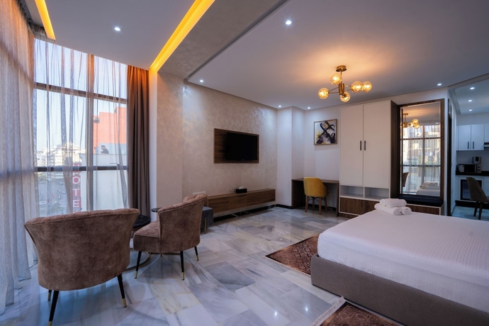 Imagen de la habitación del Hotel IMMOKA SUITES. Foto 10