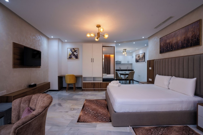 Imagen de la habitación del Hotel IMMOKA SUITES. Foto 11