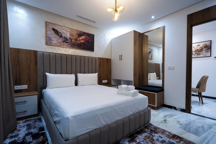 Imagen de la habitación del Hotel IMMOKA SUITES. Foto 12
