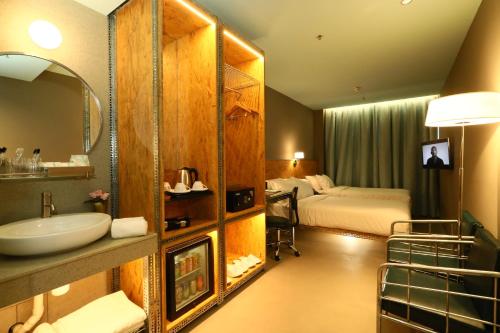 Imagen de la habitación del Hotel IND. Foto 2