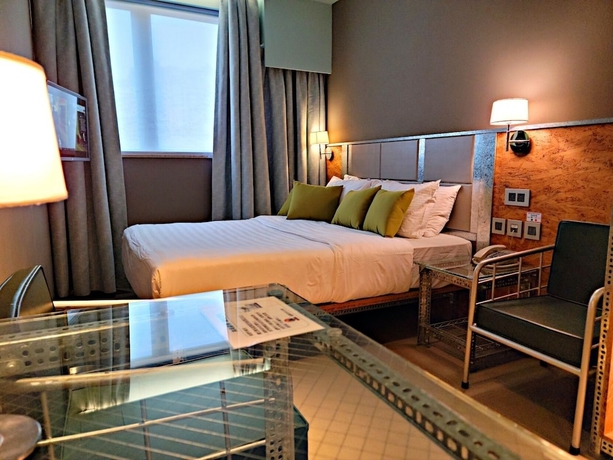 Imagen de la habitación del Hotel IND. Foto 2