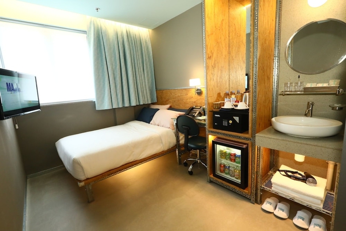 Imagen de la habitación del Hotel IND. Foto 6