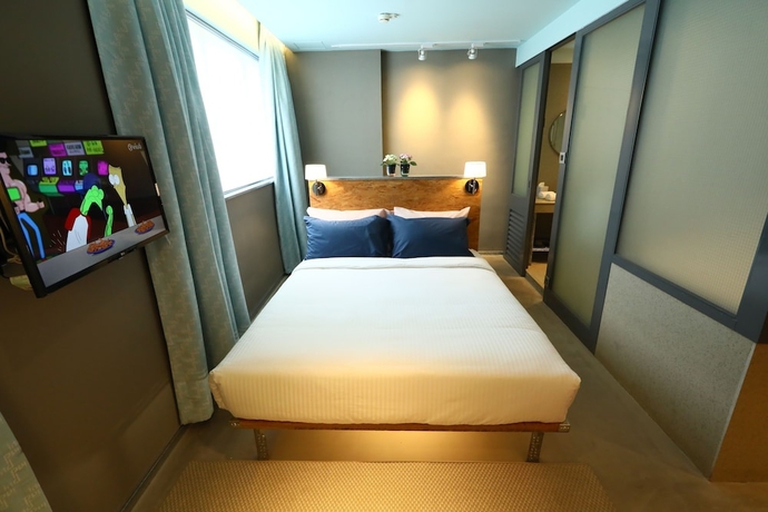 Imagen de la habitación del Hotel IND. Foto 12