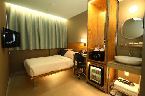 Imagen de la habitación del Hotel IND. Foto 3