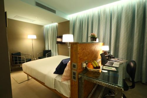 Imagen de la habitación del Hotel IND. Foto 4