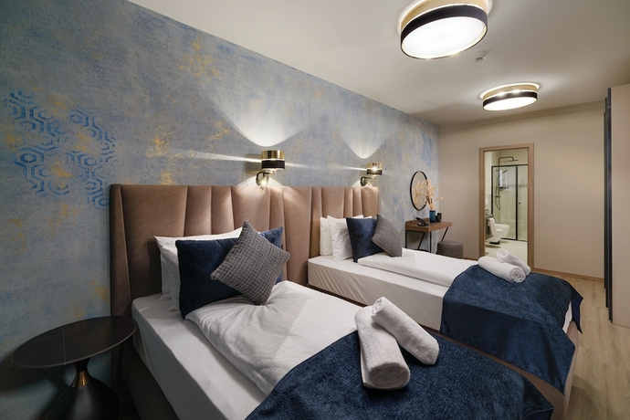 Imagen de la habitación del Hotel INFINITY Budapest. Foto 5