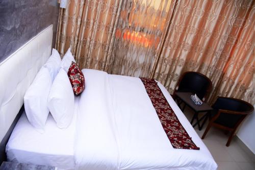 Imagen de la habitación del Hotel INFINITY HOTEL, Kigali. Foto 4