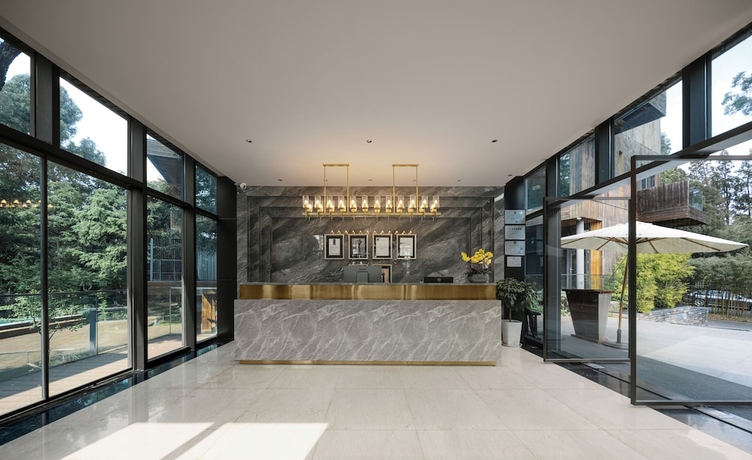 Imagen de los interiores del Hotel INN HOUSE, Kunming. Foto 16