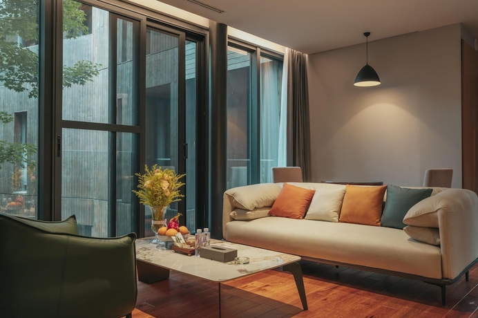 Imagen de la habitación del Hotel INN HOUSE, Kunming. Foto 12