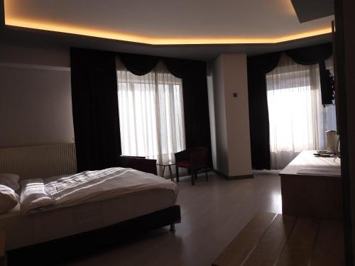 Imagen de la habitación del Hotel INN TOWN HOTEL. Foto 18