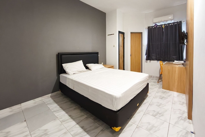 Imagen de la habitación del Hotel INNCA Singa Utara, Semarang. Foto 5