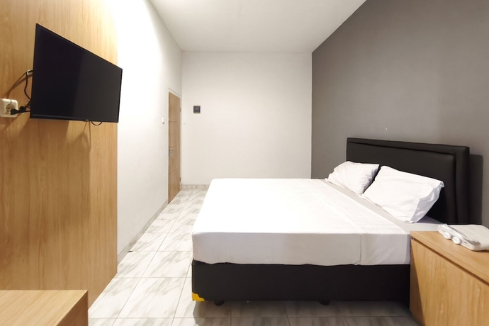 Imagen de la habitación del Hotel INNCA Singa Utara, Semarang. Foto 6