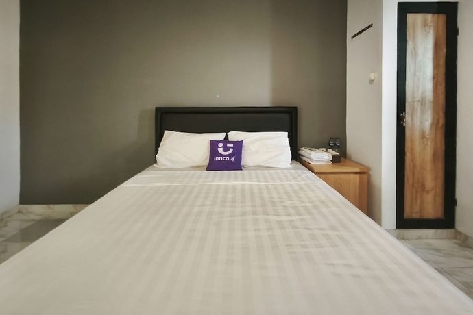 Imagen de la habitación del Hotel INNCA Singa Utara, Semarang. Foto 7