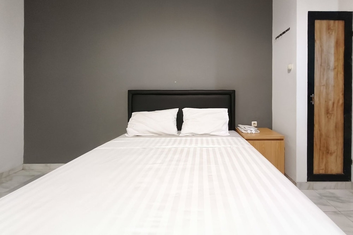 Imagen de la habitación del Hotel INNCA Singa Utara, Semarang. Foto 8