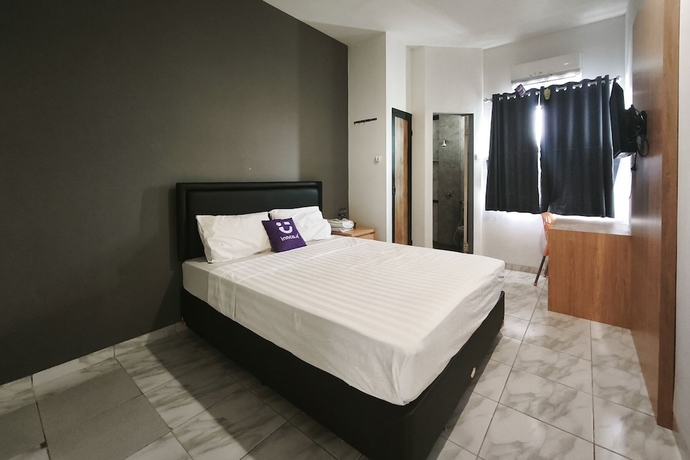Imagen de la habitación del Hotel INNCA Singa Utara, Semarang. Foto 9