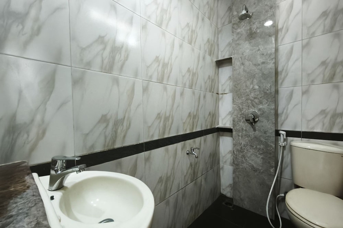 Imagen de la habitación del Hotel INNCA Singa Utara, Semarang. Foto 10