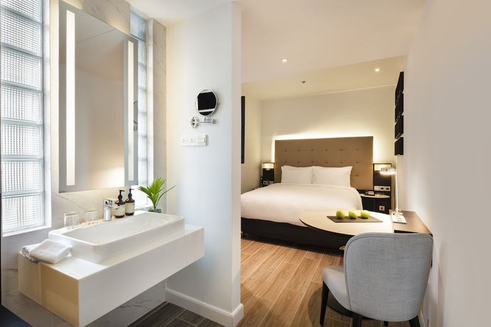 Imagen de la habitación del Hotel INNSiDE Saigon Central. Foto 5