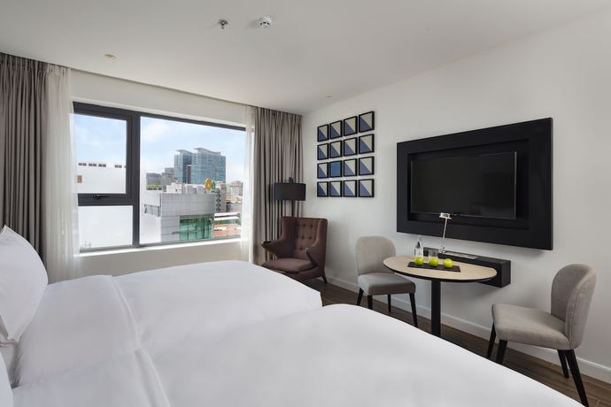 Imagen de la habitación del Hotel INNSiDE Saigon Central. Foto 6