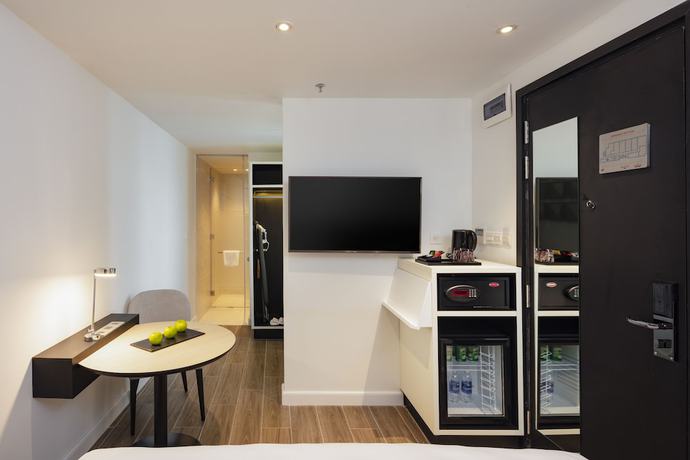 Imagen de la habitación del Hotel INNSiDE Saigon Central. Foto 10
