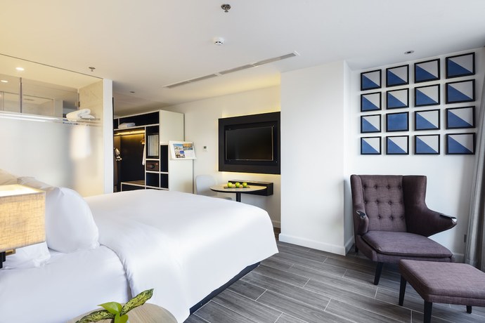Imagen de la habitación del Hotel INNSiDE Saigon Central. Foto 11