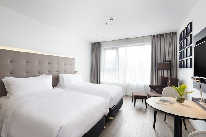 Imagen de la habitación del Hotel INNSiDE Saigon Central. Foto 12