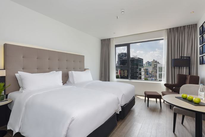 Imagen de la habitación del Hotel INNSiDE Saigon Central. Foto 13