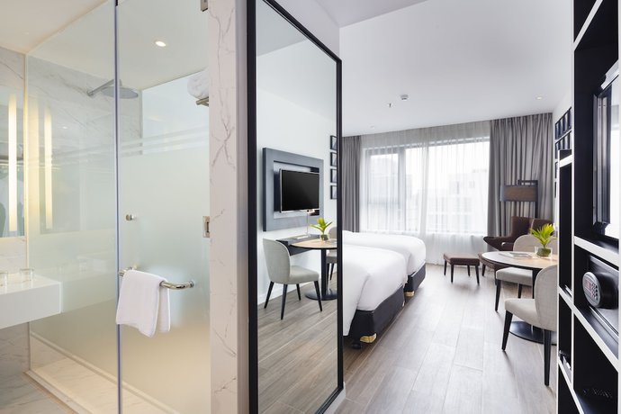Imagen de la habitación del Hotel INNSiDE Saigon Central. Foto 15
