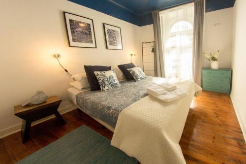 Imagen de la habitación del Hotel INT Lisbon Suites. Foto 19