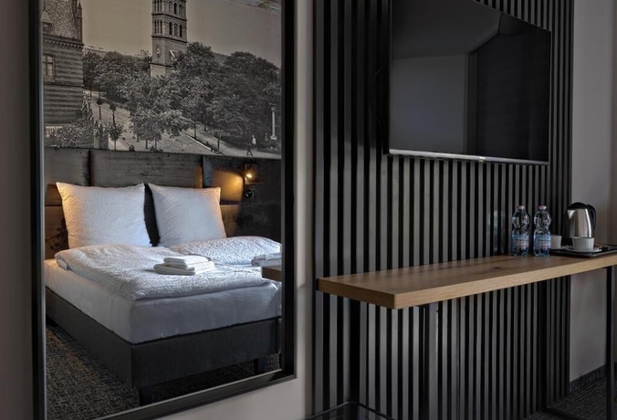 Imagen de la habitación del Hotel INTECnoclegi. Foto 4