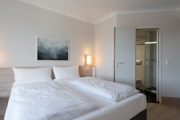 Imagen de la habitación del Hotel INTERCITY KIEL. Foto 11