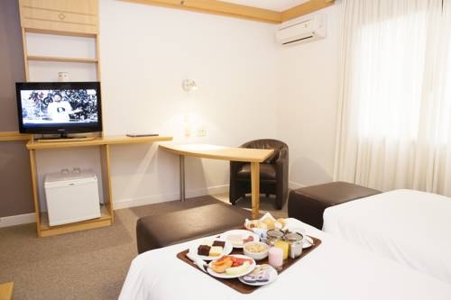 Imagen de la habitación del Hotel INTERCITY PREMIUM GRAVATA&Iacute;. Foto 6