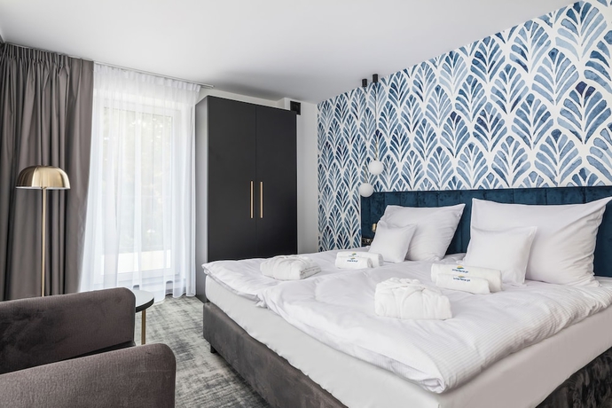 Imagen de la habitación del Hotel INTERFERIE Argentyt w Dąbkach. Foto 4