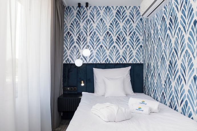 Imagen de la habitación del Hotel INTERFERIE Argentyt w Dąbkach. Foto 6