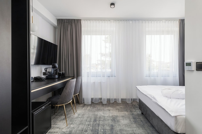 Imagen de la habitación del Hotel INTERFERIE Argentyt w Dąbkach. Foto 7
