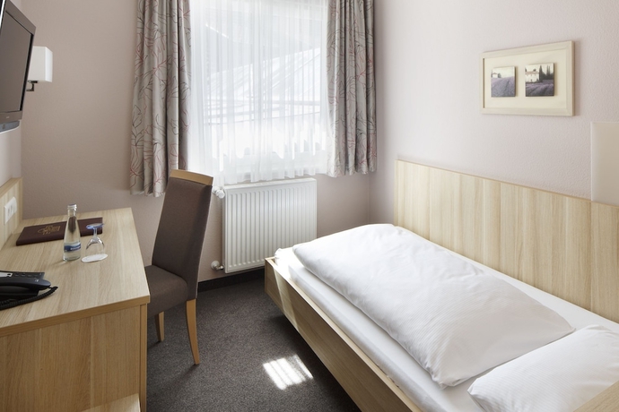 Imagen de la habitación del Hotel INVITE Löwen. Foto 8