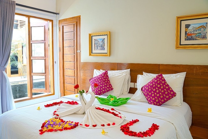 Imagen de la habitación del Hotel IOOVE Tanjung Seminyak Suites. Foto 4