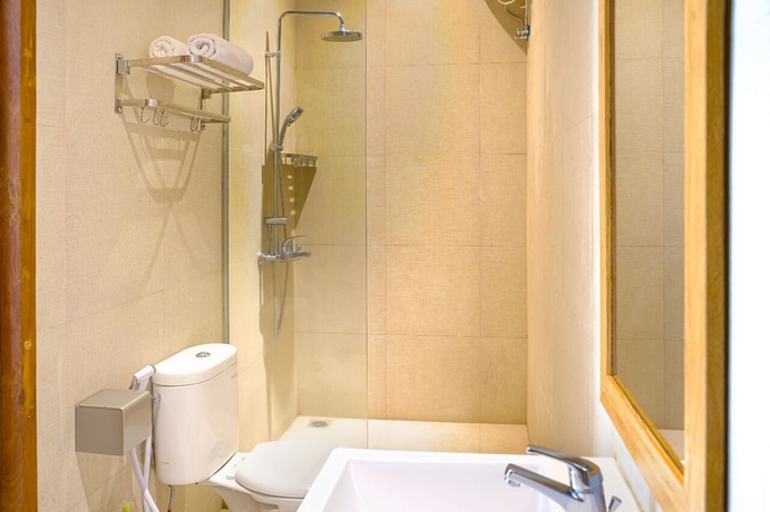 Imagen de la habitación del Hotel IOOVE Tanjung Seminyak Suites. Foto 12