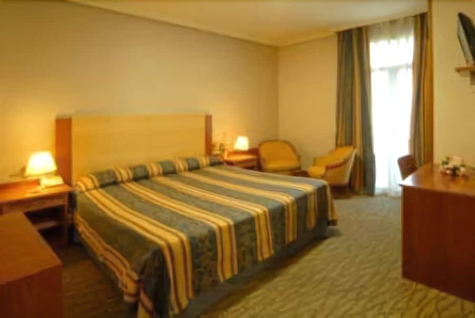 Imagen de la habitación del Hotel ITC Mora. Foto 8
