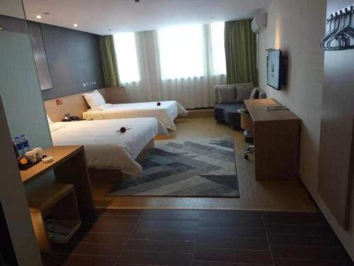 Imagen general del Hotel IU Zhengzhou Erqi Wanda Plaza Daxue Road Branch. Foto 12