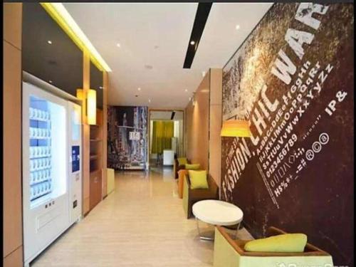 Imagen general del Hotel IU Zhengzhou Xinzheng Sias International University Branch. Foto 1