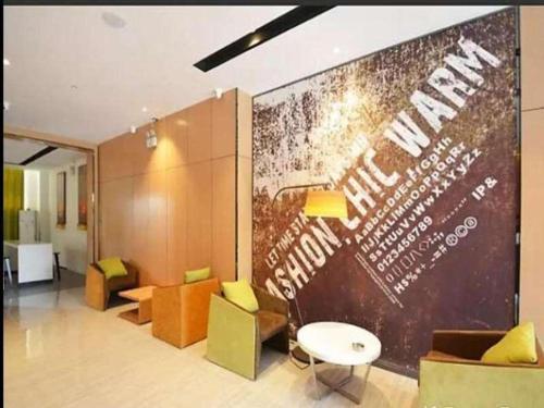 Imagen general del Hotel IU Zhengzhou Xinzheng Sias International University Branch. Foto 2