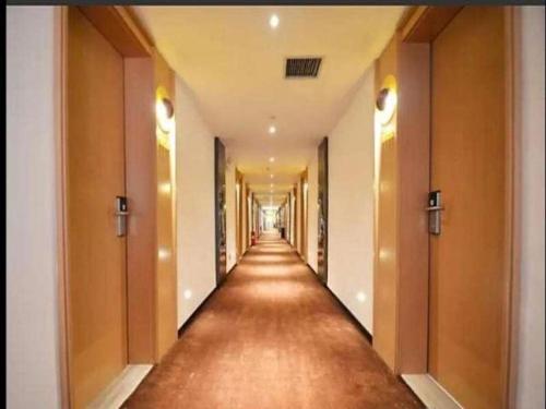 Imagen general del Hotel IU Zhengzhou Xinzheng Sias International University Branch. Foto 4