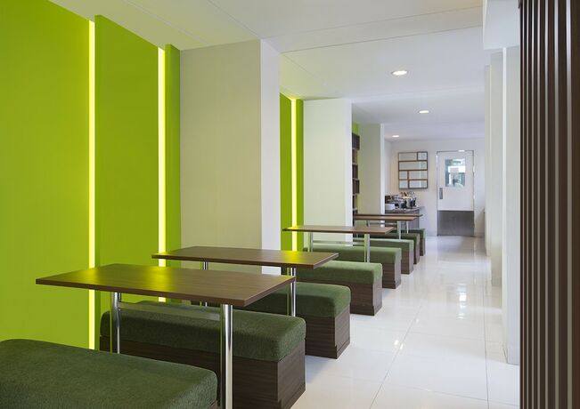 Imagen del bar/restaurante del Hotel IXO Bekasi. Foto 7