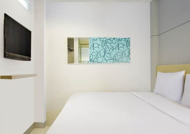 Imagen de la habitación del Hotel IXO Bekasi. Foto 8