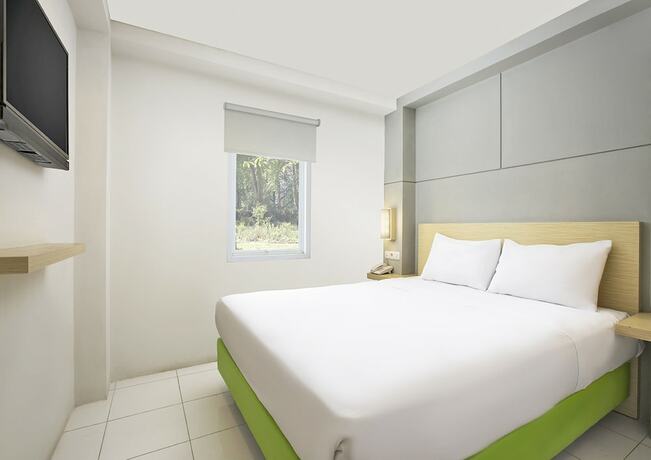 Imagen de la habitación del Hotel IXO Bekasi. Foto 9