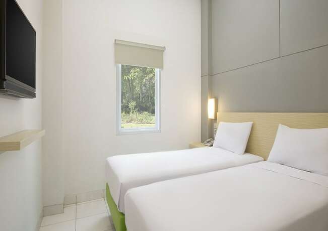 Imagen de la habitación del Hotel IXO Bekasi. Foto 10