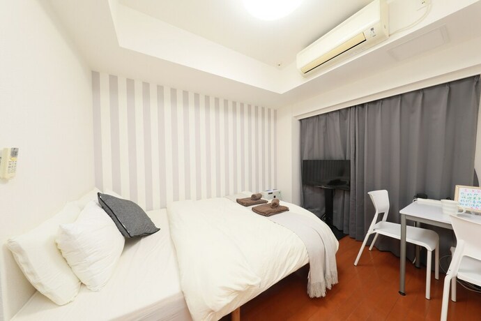 Imagen de la habitación del Hotel Ibasho Shibuya Dogenzaka 810. Foto 25