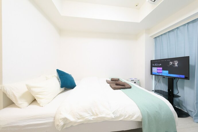 Imagen de la habitación del Hotel Ibasho Shibuya Dogenzaka 903. Foto 26