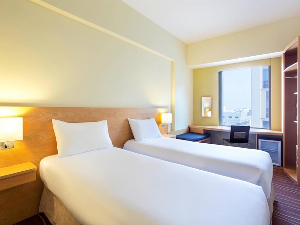 Imagen de la habitación del Hotel Ibis Al Rigga. Foto 14