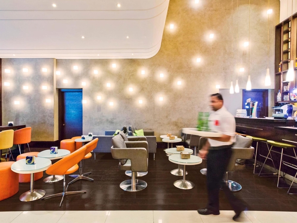 Imagen del bar/restaurante del Hotel Ibis Al Rigga. Foto 9